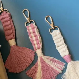 Handcrafted light mauve pink and off white macrame keychain with cotton tassels and gold clasp